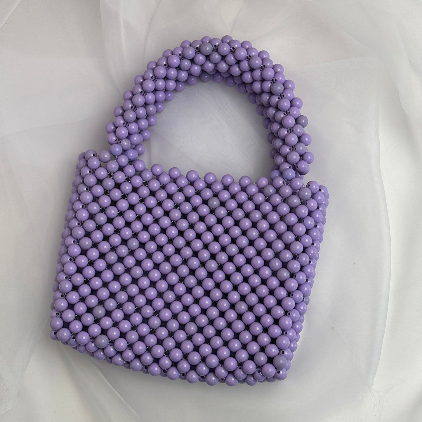 Bunte Taschen mit Perlen